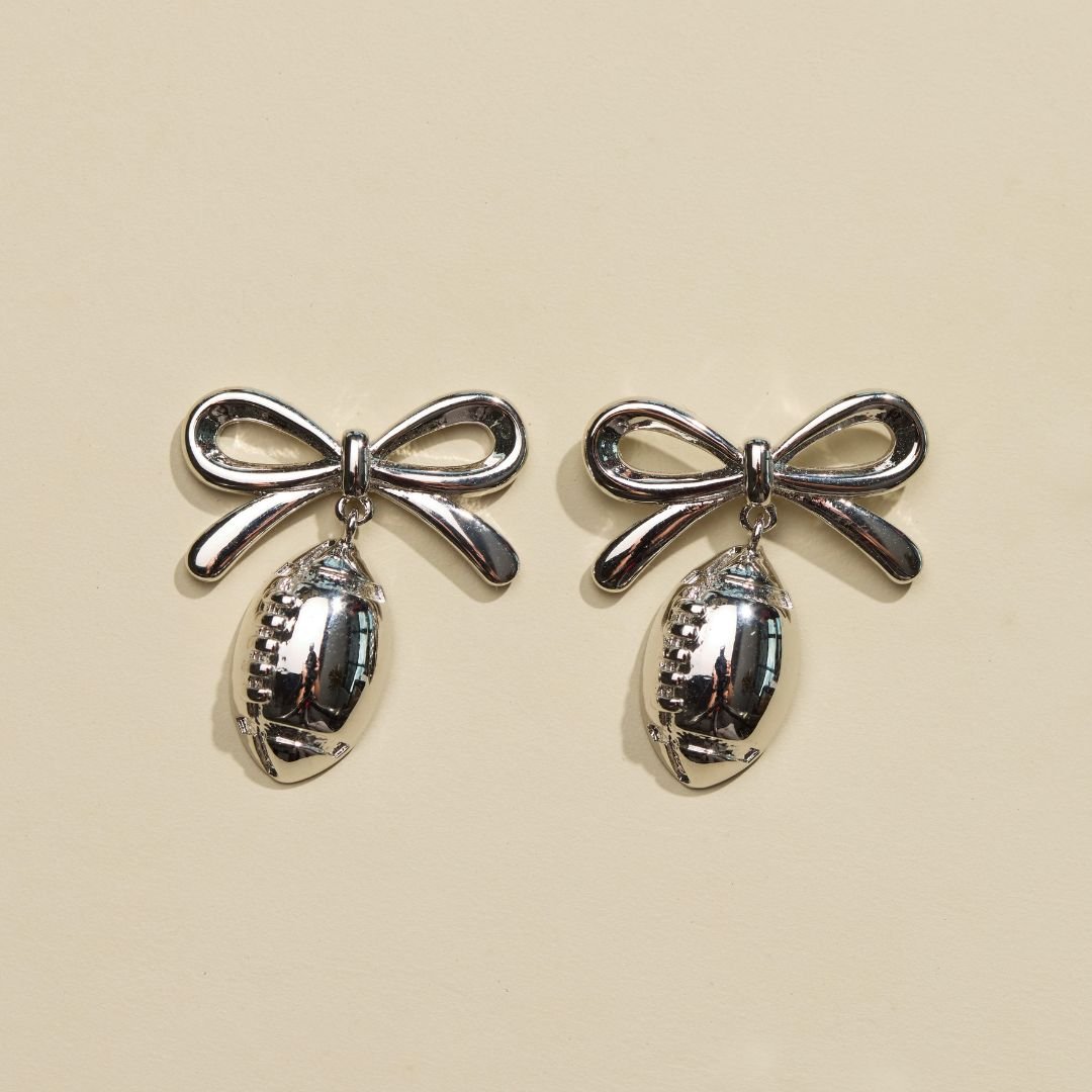 Silver Football & Bow Drop Studs